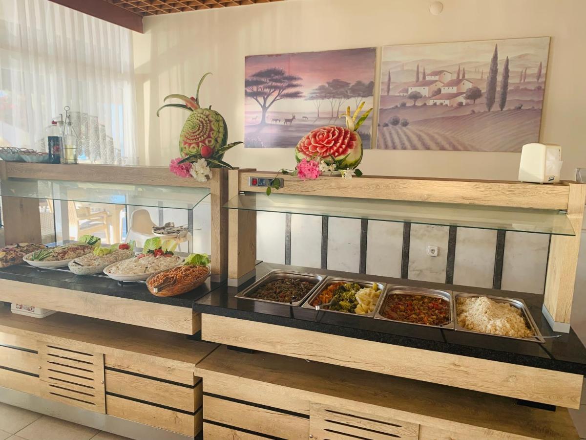 Holiday Hotel คูซาดาซี ภายนอก รูปภาพ
